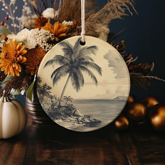 a ceramic ornament with a palm tree on it