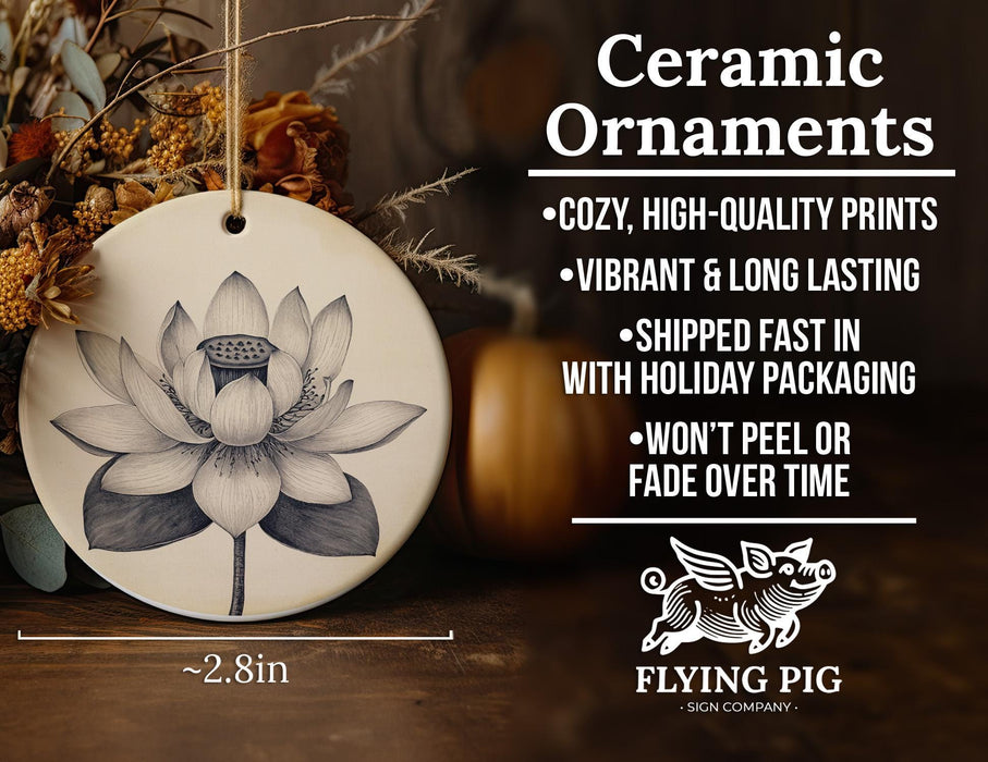 a ceramic ornament with a picture of a flower on it