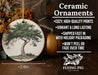 a ceramic ornament with a tree on it