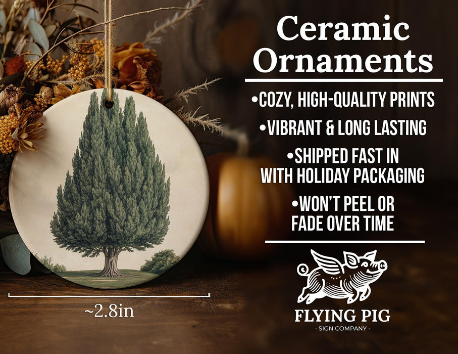 a ceramic ornament with a picture of a tree on it