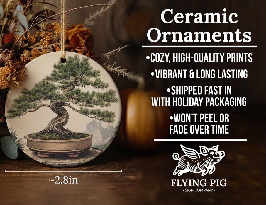 a ceramic ornament with a bonsai tree on it