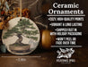 a ceramic ornament with a bonsai tree on it