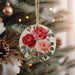 a christmas ornament hanging from a christmas tree