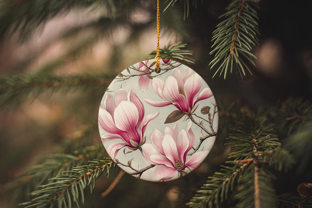 a ceramic ornament hanging from a tree