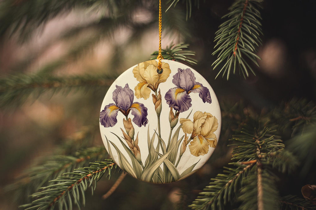 a ceramic ornament hanging from a christmas tree