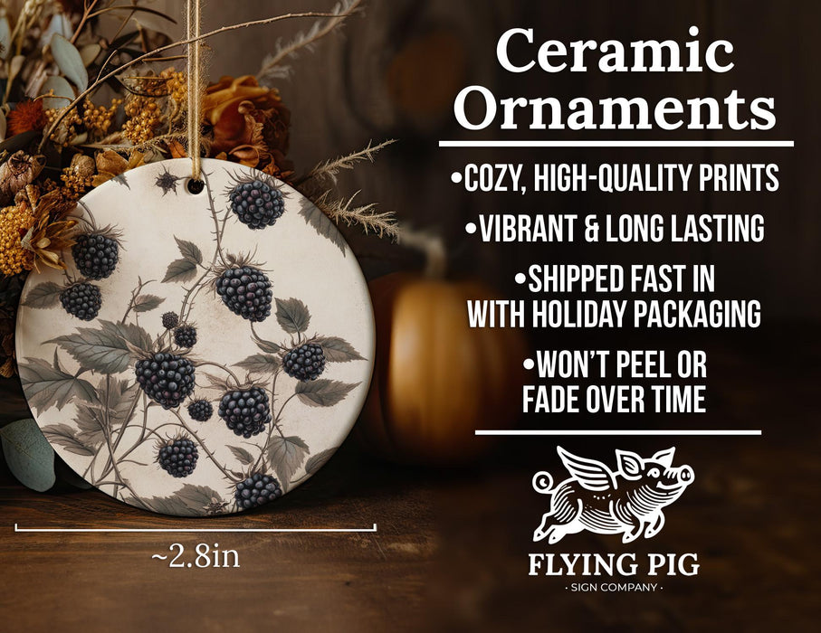 a ceramic ornament with berries and leaves on it