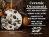 a ceramic ornament with berries and leaves on it