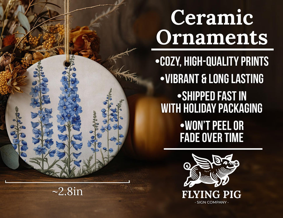 a ceramic ornament with blue flowers on it