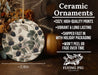 a ceramic ornament hanging on a wooden table