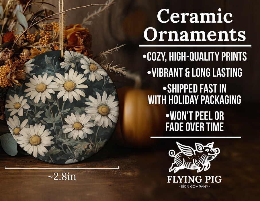 a picture of a ceramic ornament with daisies on it