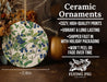 a ceramic ornament with blue berries on it