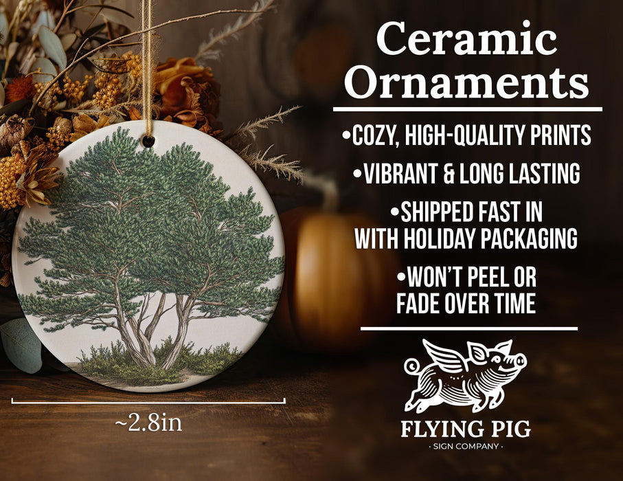 a ceramic ornament with a tree on it