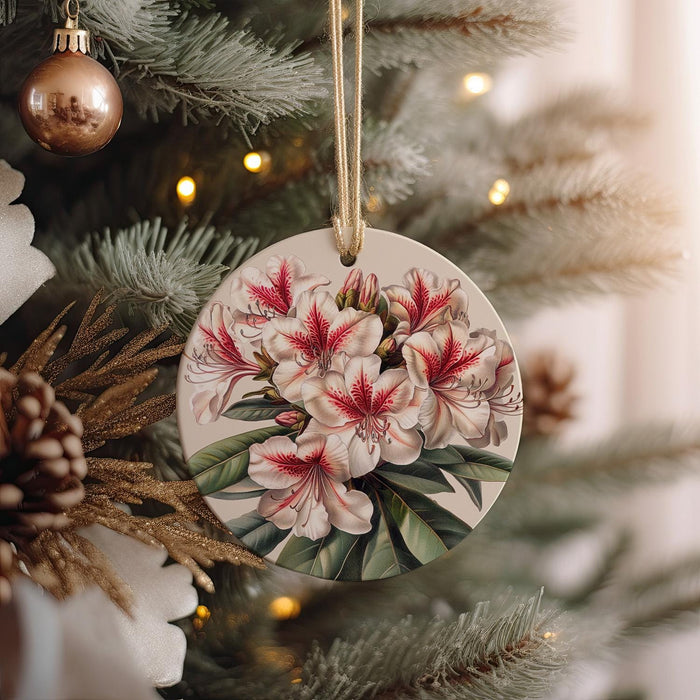 a christmas ornament hanging from a christmas tree