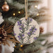 a ceramic ornament hanging from a christmas tree