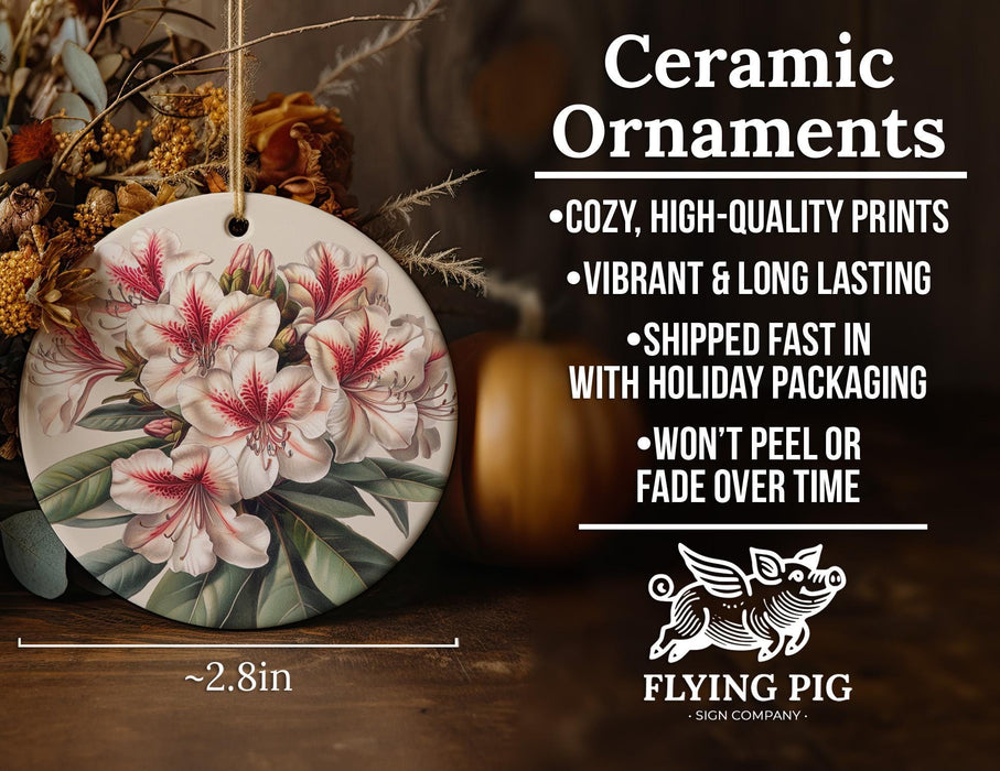 a ceramic ornament with flowers on it