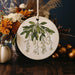 a white plate with a floral design on it