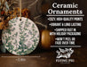 a ceramic ornament with a floral design on it