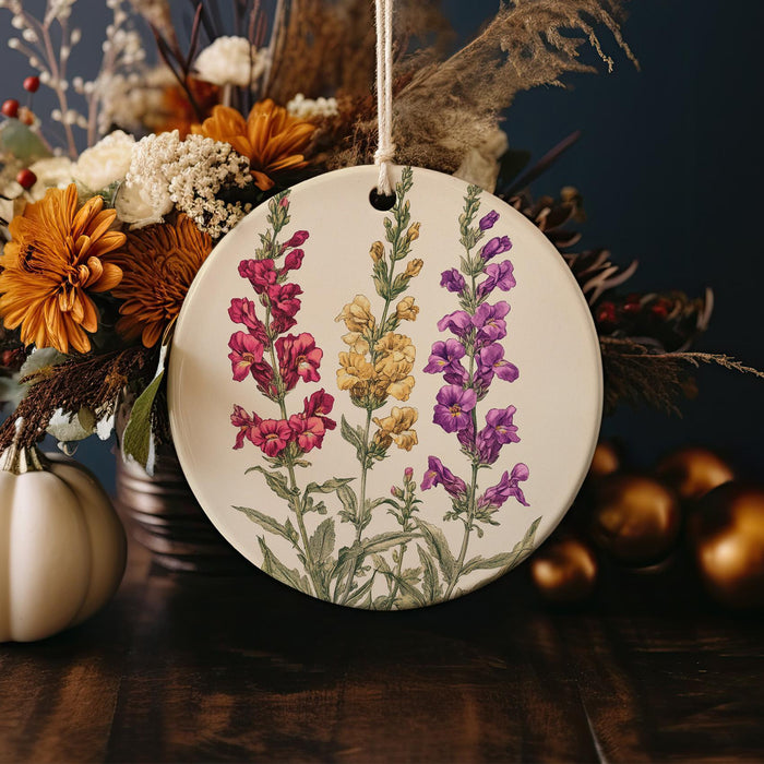 a ceramic ornament with flowers on a table