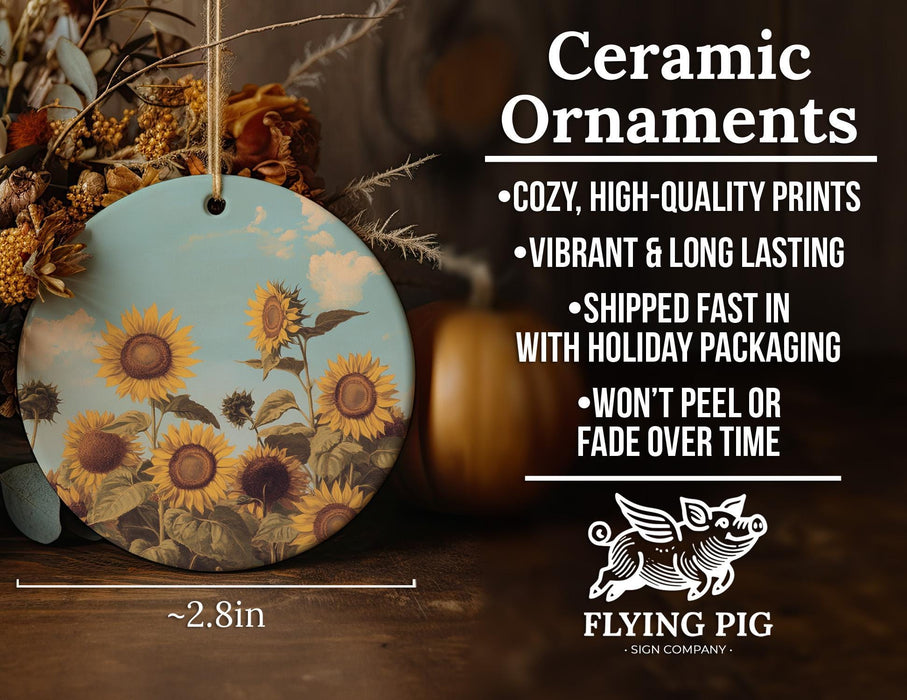 a ceramic ornament with sunflowers on it
