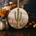 a picture of a cactus hanging from a string
