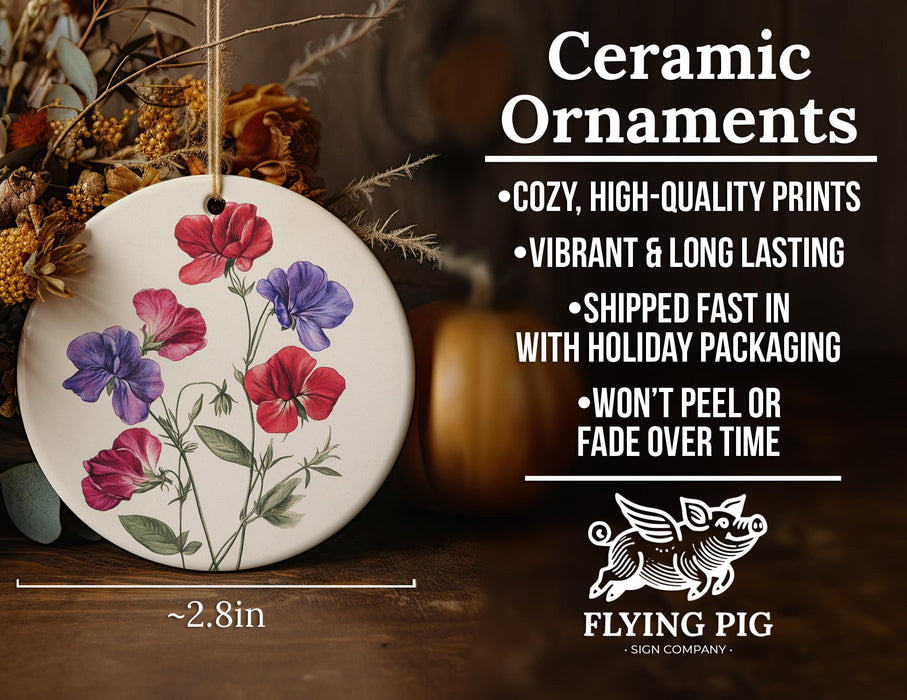 a ceramic ornament with flowers painted on it