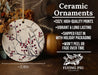 a ceramic ornament with red berries on it