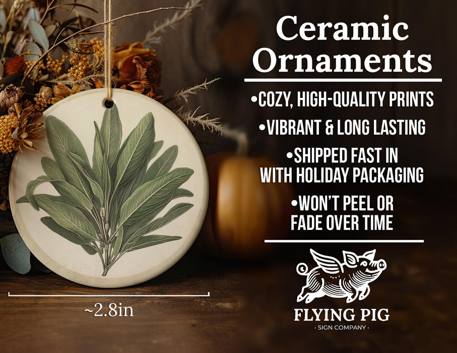 a ceramic ornament with a green leaf on it