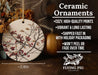 a ceramic ornament with red berries on it