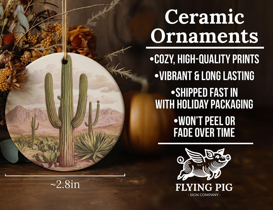 a ceramic ornament with a cactus on it