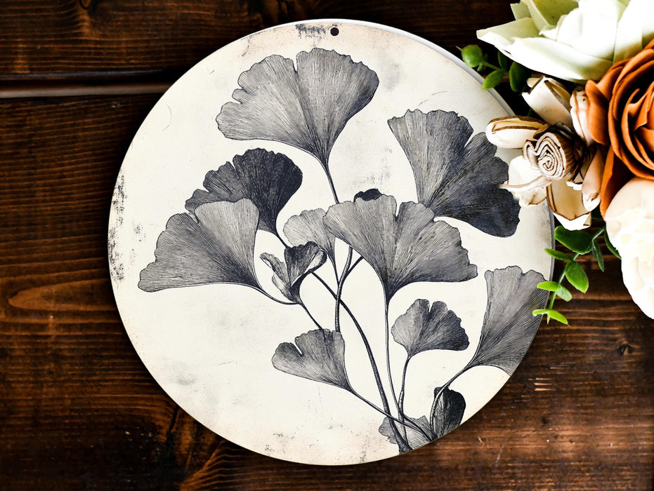 a plate with flowers on it sitting on a table