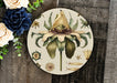 a picture of a flower on a wooden surface