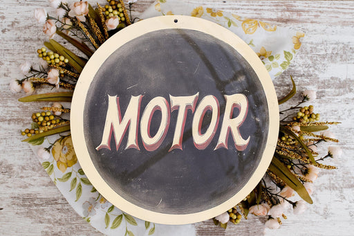 a picture of the word motor on a plate