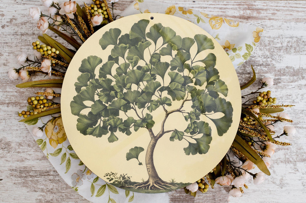 a plate with a tree painted on it