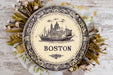 a plate with a picture of boston on it