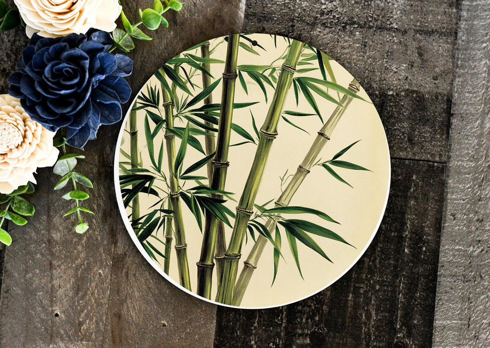 a plate with a picture of a bamboo plant on it