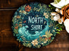 a picture of a plate with the words north shore painted on it