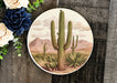 a plate with a picture of a cactus on it
