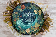a picture of a plate with the words north shore painted on it