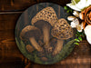 a group of mushrooms sitting on top of a wooden table