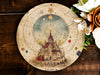 a plate with a picture of a building on it