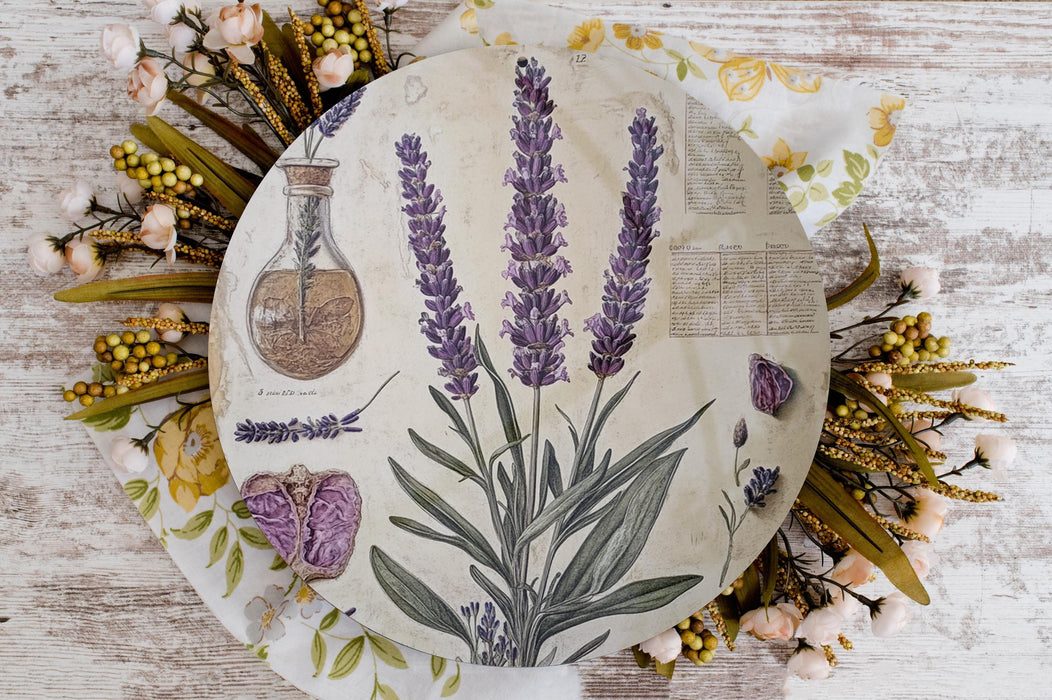 a paper plate with flowers and a flask on it