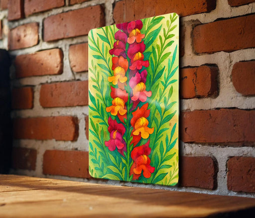 a painting of flowers on a brick wall
