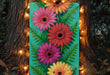 a painting of colorful flowers on a green background