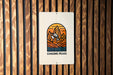a sign on a wooden wall that says chasing peaks