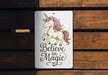 a sign that says believe magic with a unicorn on it