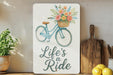 a picture of a bicycle with flowers on it