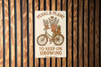 a sign on a wooden wall that says pedal & plant to keep on growing