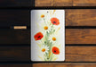 a picture of some flowers on a wooden bench