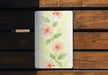 a painting of pink flowers on a white plate