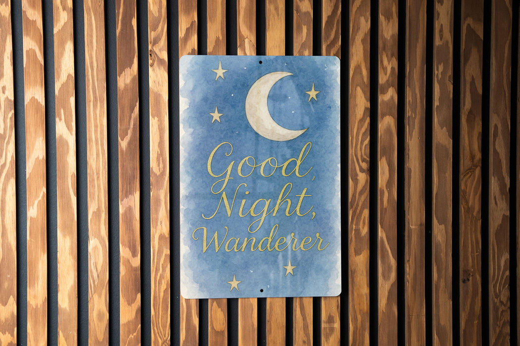 a wooden wall with a sign that says good night wander